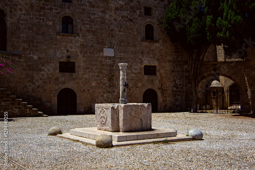 Fototapeta Naklejka Na Ścianę i Meble -  Fountain at Argirokastrou Square in the old town of Rhodes, Greece