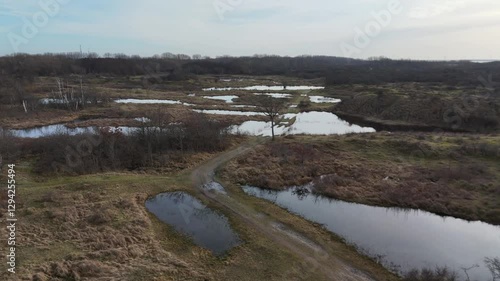 wet dunes during winter in the netherlands drone flight