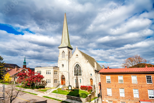 Bild auf Leinwand White stone Church under the blue Maryland sky in Cumberland