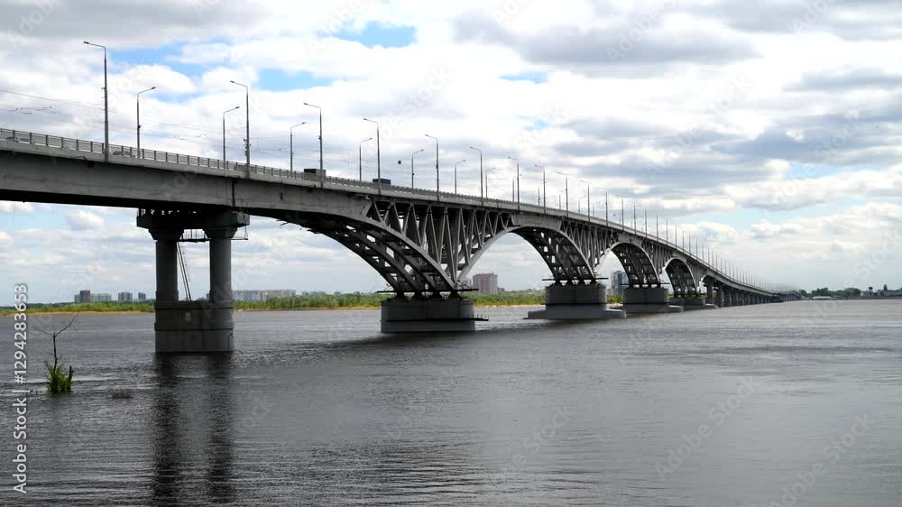 Automobile bridge over the Volga River on a cloudy day. Saratov, Russia Automobile bridge over the Volga River on a cloudy day. Saratov, Russia
