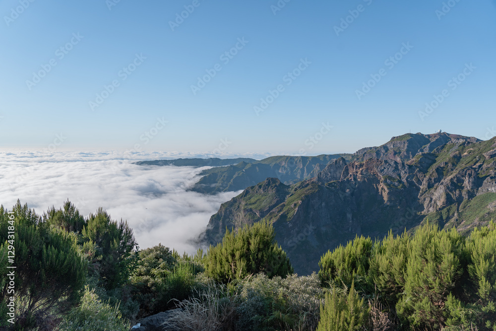 Fototapeta premium Mountain view over the clouds.