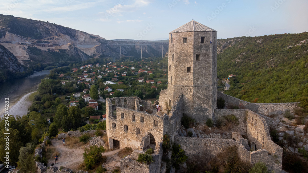 Počitelj Castle tourist village in Bosnia and Herzegovina. Aerial view of ancient tower ruins. Počitelj Castle tourist village in Bosnia and Herzegovina. Aerial view of ancient tower ruins.