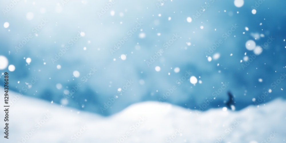 Fototapeta premium Snowy mountains covered in white winter blanket, snow particles falling down from the sky