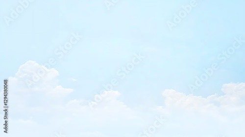 A light, pale blue sky dotted with gentle wisps of clouds, creating a tranquil and airy scene.