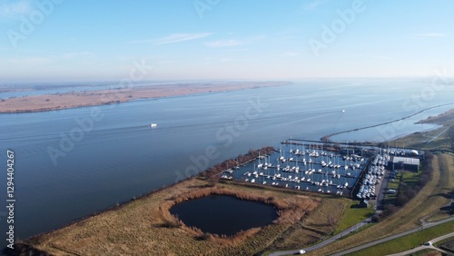 Port of City at Haringvliet in the Netherlands. A small coastal town with a marina where sailing yachts and motor yachts are moored on the Hollandsdiep near Goeree Overflakkee.