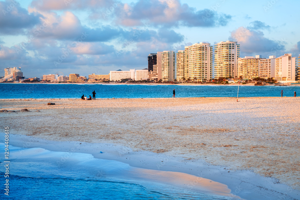 Sand beach in Cancun city center in pink sunrise light, Mexico