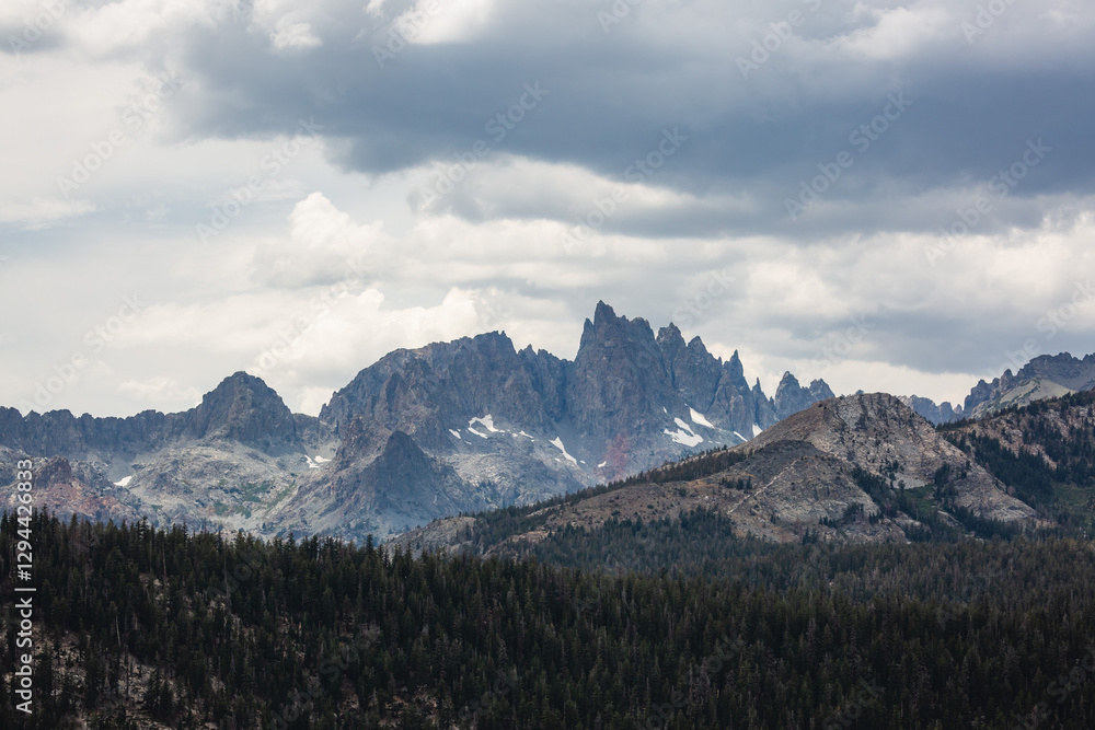 Jagged mountains among clouds in California. Jagged mountains among clouds in California.