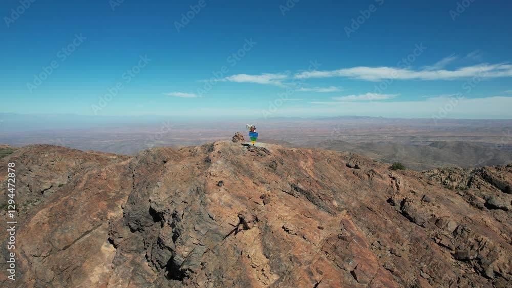 Aerial View of Peak Lkest with Climbers at the Summit, Morocco – February 27, 2025