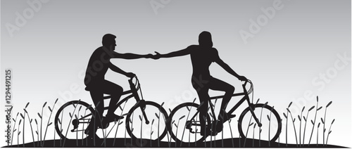 COUPLE DECYCLISTES A LA TOMBEE DE LA NUIT.eps