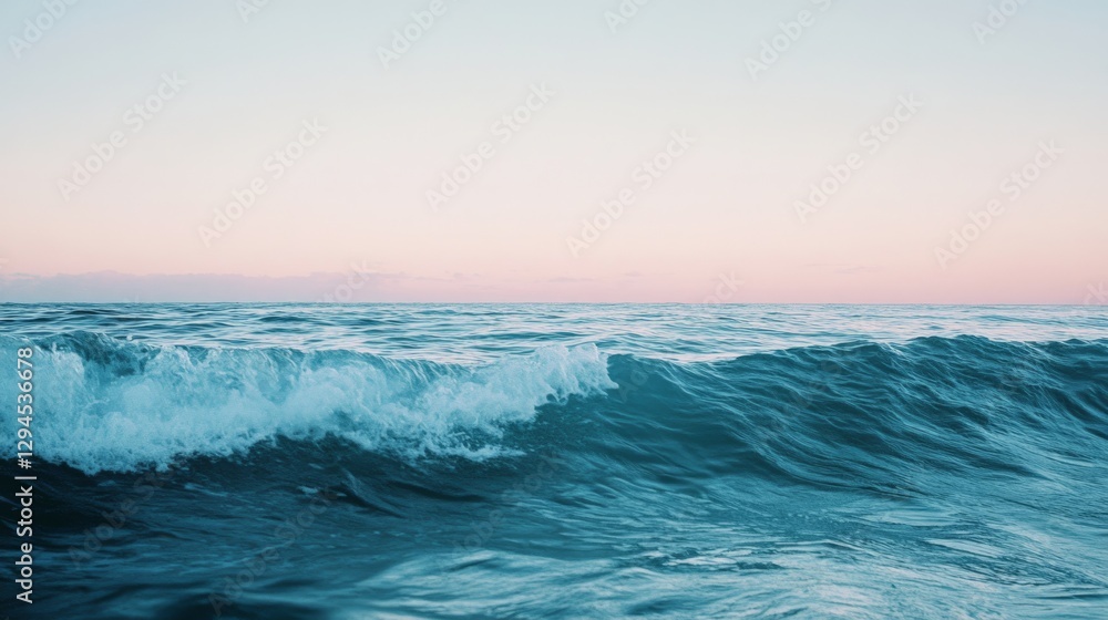 Fototapeta premium A vast ocean scene unfolds under a soft pastel sky, where the rolling waves breathe a sense of calm and infinite possibility.