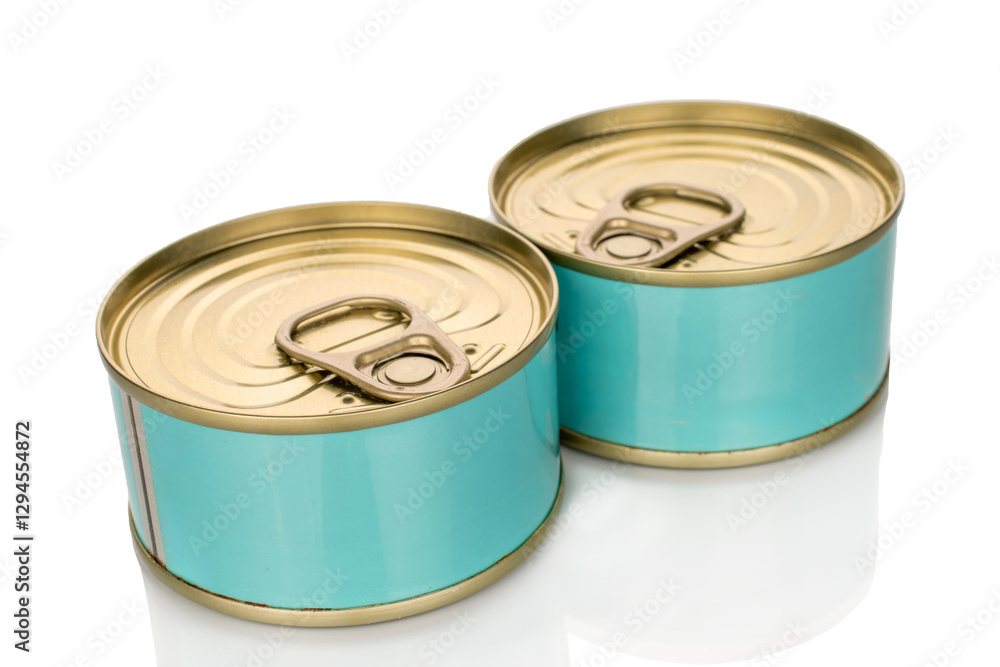Two metal cans of tuna, close-up, isolated on a white background. Two metal cans of tuna, close-up, isolated on a white background.