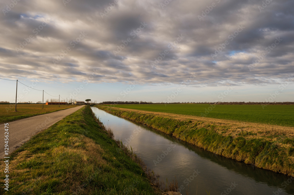 Obraz premium the river Po inside its Veneto side Delta during a winter season, Rovigo, Italy