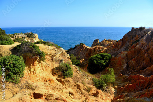 walking path with breathtaking views through the coast from porches to benagil caves lagoa algarve portugal