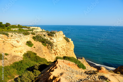 walking path with breathtaking views through the coast from porches to benagil caves lagoa algarve portugal