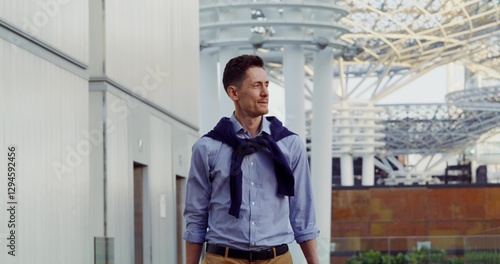 Wallpaper Mural A stylish man walks along a city street looking at the sights of the city. Dubai Torontodigital.ca