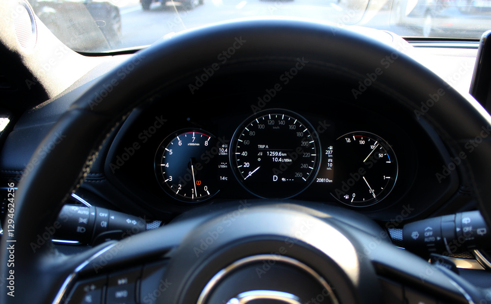 Car instrument cluster with many icons and backlit symbols on it. Tire pressure icon on car dashboard
Car instrument cluster with many icons and backlit symbols on it. Tire pressure icon on car dashboard