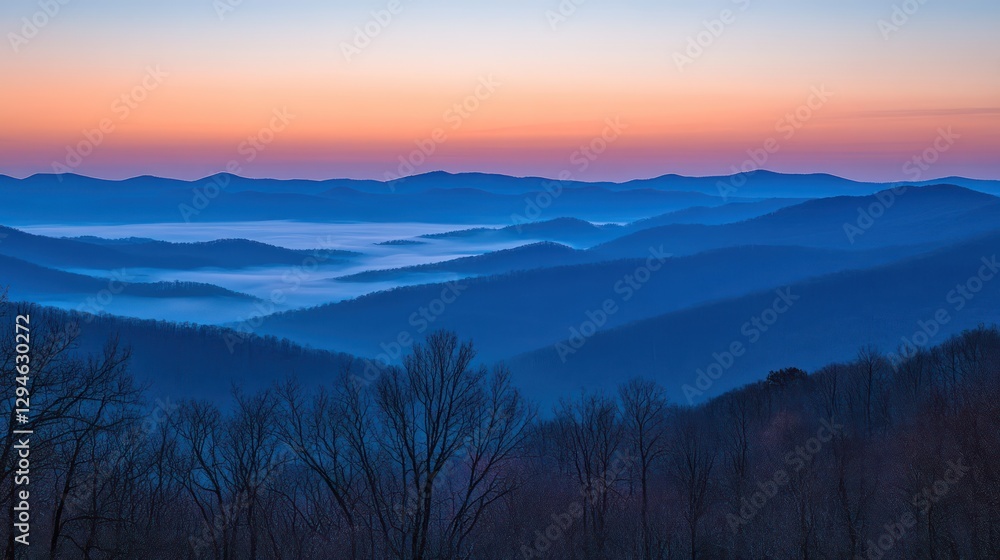 Obraz premium Serene Mountain Landscape at Dawn with Misty Valleys