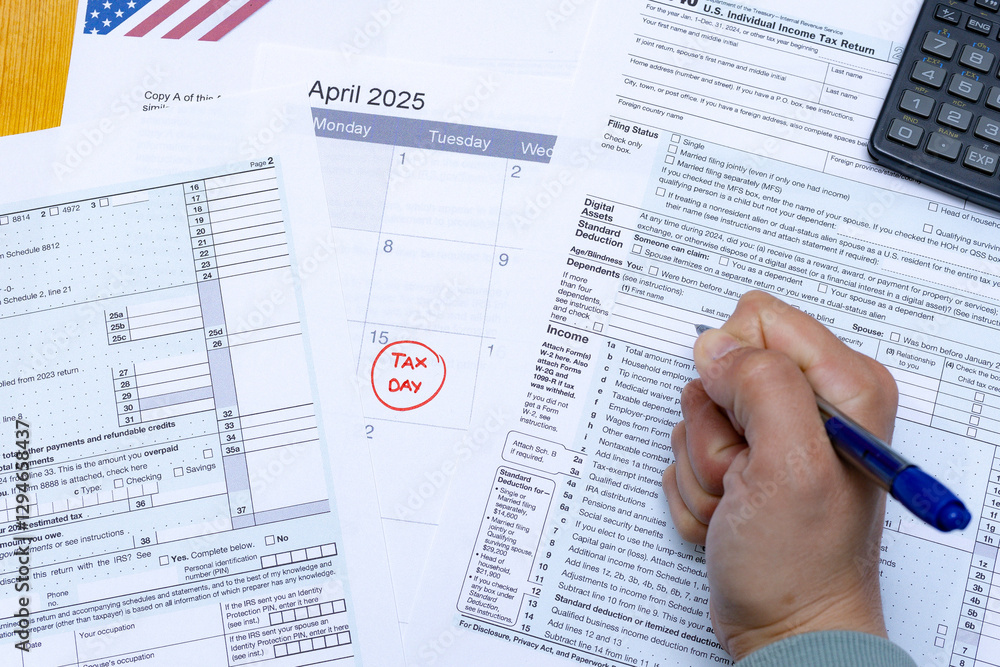 Obraz premium Frustrated taxpayer filling out IRS forms before the Tax Day deadline