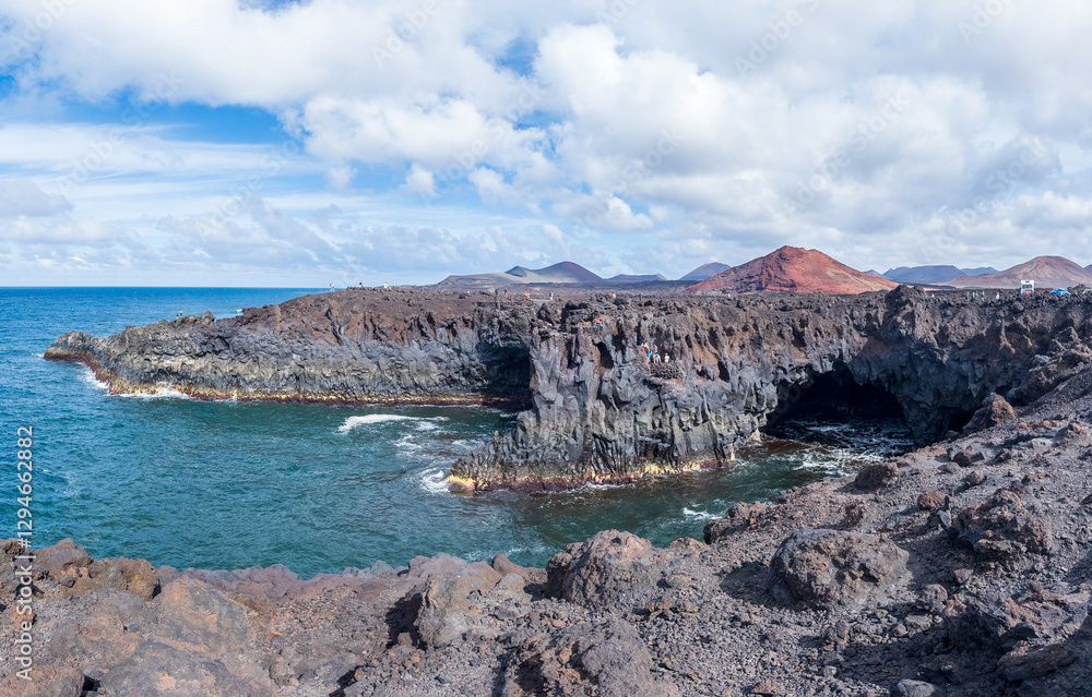 Majestic Volcanic Coastline with Rugged Cliffs and Ocean Majestic Volcanic Coastline with Rugged Cliffs and Ocean