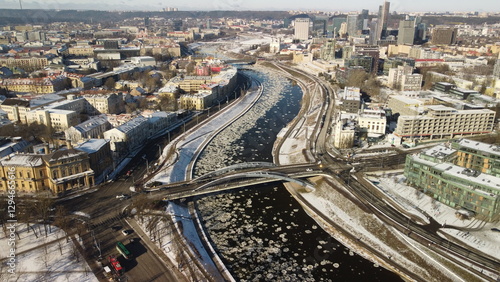The Mindaugas Bridge is a bridge in Vilnius, Lithuania. It crosses Neris River and connects Žirmūnai elderate with the Old Town of Vilnius