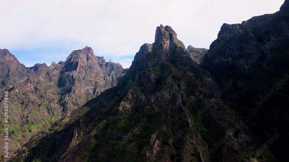 Majestic mountain landscape in vibrant wilderness showcases nature's beauty and rugged terrain Majestic mountain landscape in vibrant wilderness showcases nature's beauty and rugged terrain