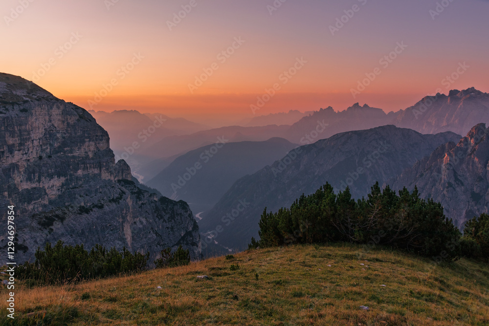 Cadini di Misurina view during sunrise with golden hour warm light