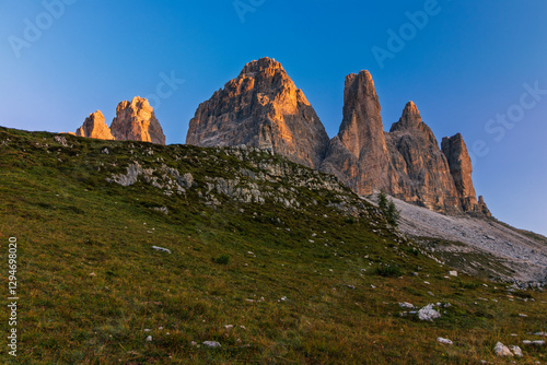 Obraz na płótnie Tre Cime di Lavaredo during sunrise with warm golden light w salonie