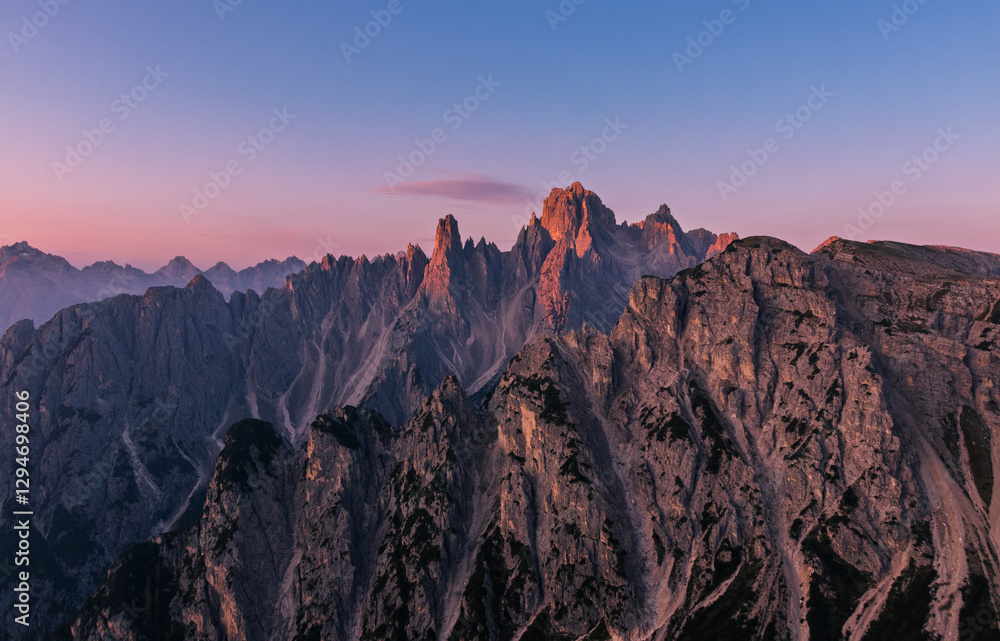 Cadini di Misurina view during sunrise with golden hour warm light