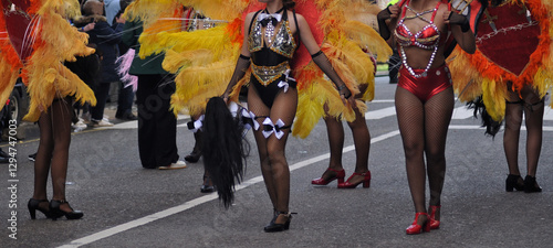 Dancers in a burlesque street parade, an atmosphere of party and celebration, colors, joy, and happiness