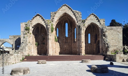 Fototapeta Naklejka Na Ścianę i Meble -  Photo of the ruins (Destroyed in WWII) of the Church of the Virgin of the Burgh in Rhodes, Greece. Dating back to the 14th century, it was likely one of the first structures built by the Knights.