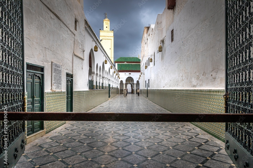 Fototapeta premium Moulay Idriss Zerhoun, Morocco - March 20, 2024: Interior of complex of the mausoleum of Moulay Idris in the holy city of Moulay Idriss Zerhoun. View of the mosque