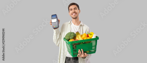 Young man with full shoppin...