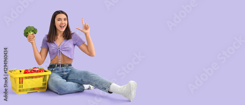 Young woman with broccoli a...