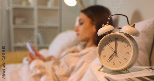 Alarm clock on table of you...