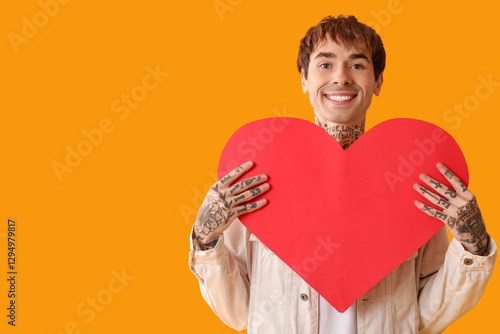 Happy young man with red pa...