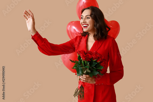 Happy young woman with bouq...