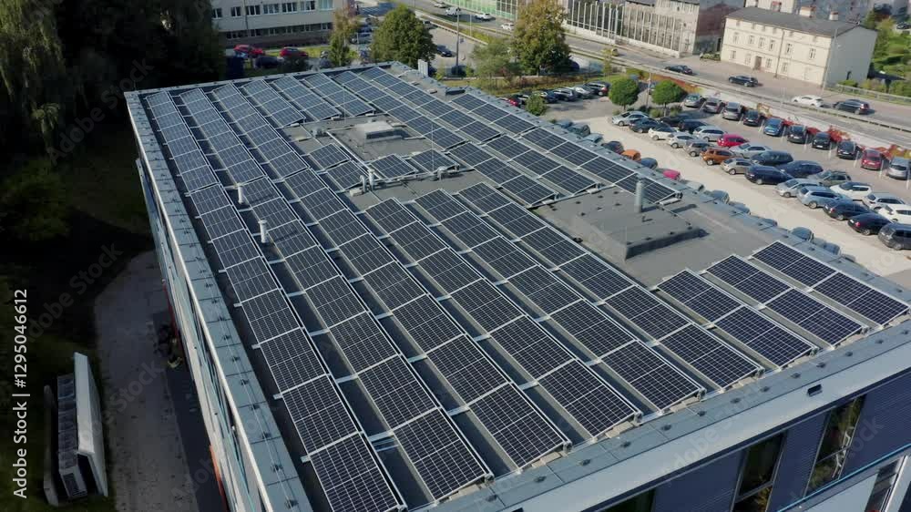 Aerial View Of Solar Panels On The Roofs Of Residential Buildings. These Panels Produce Clean Energy, Supporting Renewable Energy Solutions For The Power Grid In A European Town. Aerial View Of Solar Panels On The Roofs Of Residential Buildings. These Panels Produce Clean Energy, Supporting Renewable Energy Solutions For The Power Grid In A European Town.