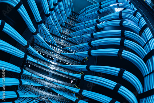 Tablou pe pânză Vibrant Network Cables Bundled in Server Rack for Data Center Use