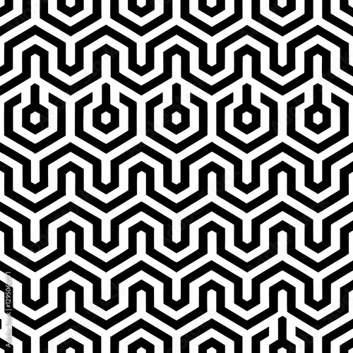 Intricate black and white geometric maze pattern with interconnected lines, creating a visually stimulating and modern design