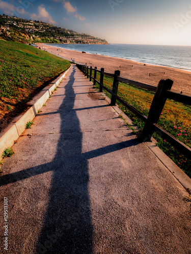 Obraz na płótnie Redondo Beach walking ramp leading down to the beach on a beautiful day with blue sky, few scattered clouds with an empty beach and a clear view of the Palos Verdes Peninsula w salonie
