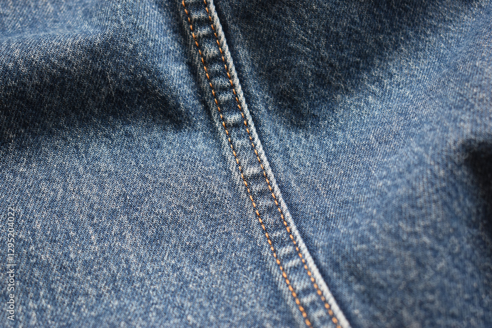 Fototapeta premium seam of blue denim texture background, jean fashion style
