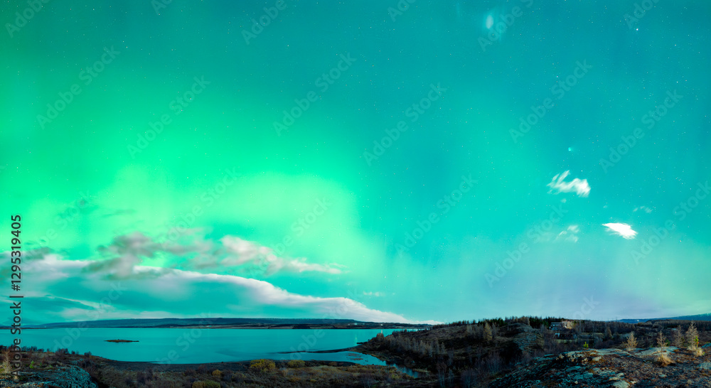 Naklejka premium Aurora borealis over Lagerfljot River in Iceland - panorama