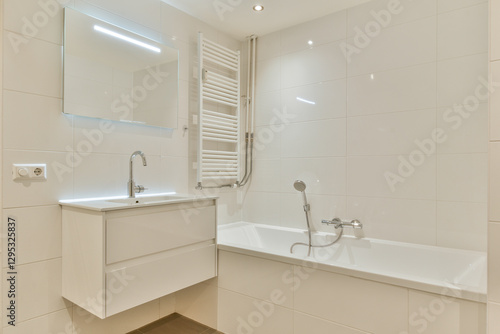 Wallpaper Mural A sleek and contemporary bathroom featuring a bathtub, wall-mounted mirror, and stylish fixtures, highlighting minimalist aesthetics and functionality. Torontodigital.ca