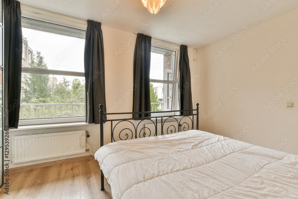 Fototapeta premium A bright and minimalistic bedroom featuring large windows, a comfortable bed, and clean lines. The design promotes tranquility and relaxation.