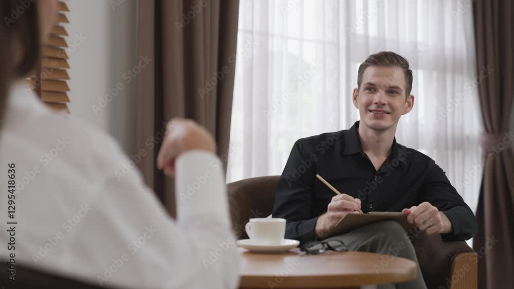 Psychological consultation gaining improvement on mental problem, young patient doing therapy session while psychiatrist making diagnostic on mental illness. Mental treatment session. Adit Psychological consultation gaining improvement on mental problem, young patient doing therapy session while psychiatrist making diagnostic on mental illness. Mental treatment session. Adit