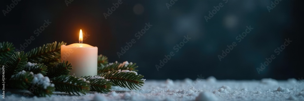 Single burning candle on fir branches against a dark grey backdrop, snow, monochromatic background Single burning candle on fir branches against a dark grey backdrop, snow, monochromatic background