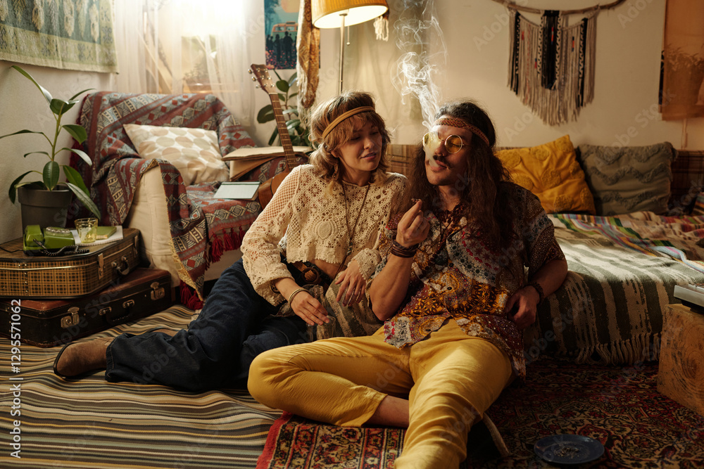 Couple enjoying relaxed moment surrounded by bohemian decor in cozy living room sharing happy and peaceful atmosphere filled with warmth and charm Couple enjoying relaxed moment surrounded by bohemian decor in cozy living room sharing happy and peaceful atmosphere filled with warmth and charm