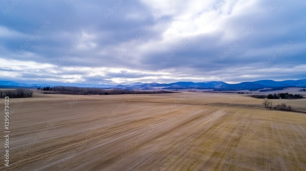 Aerial view of a vast open landscape showcasing rolling hills under a dramatic cloudy sky : Generative AI Aerial view of a vast open landscape showcasing rolling hills under a dramatic cloudy sky : Generative AI