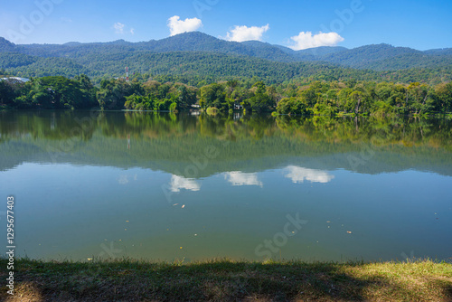 Obraz na płótnie a public place leisure travel landscape lake views at Ang Kaew Chiang Mai University and Doi Suthep nature forest Mountain views spring cloudy sky background with white cloud. w salonie