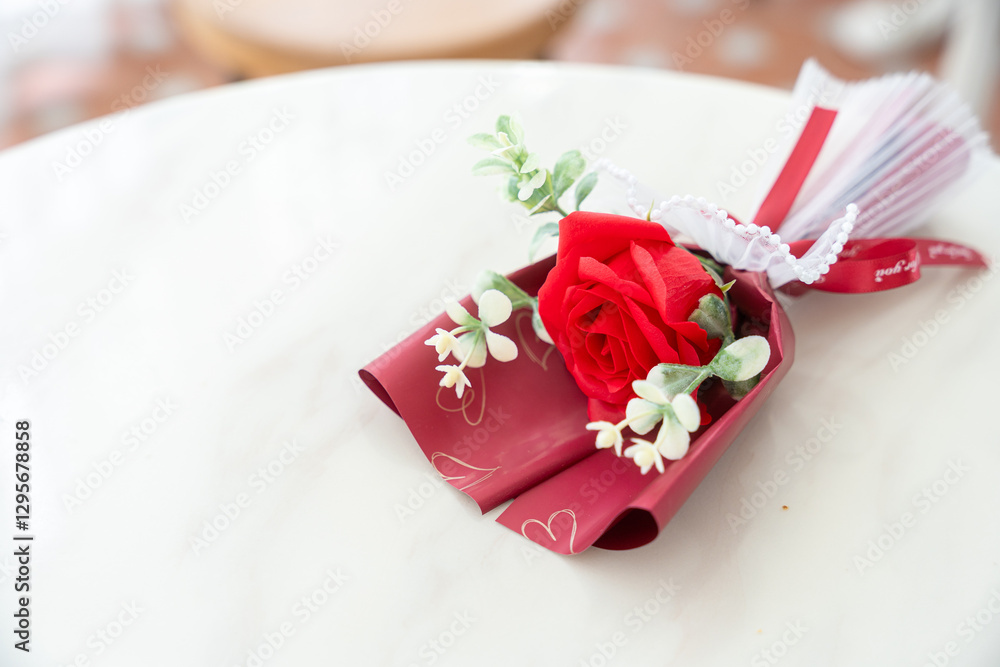 Valentine's day concept, bouquet of red and pink roses Put on the table food lunch In a restaurant background